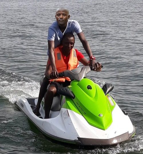 Jetski on Lake Kivu on vacation with La Cabane Africaine Ltd